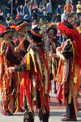 Blurred image of colourful Border moving morris dancers